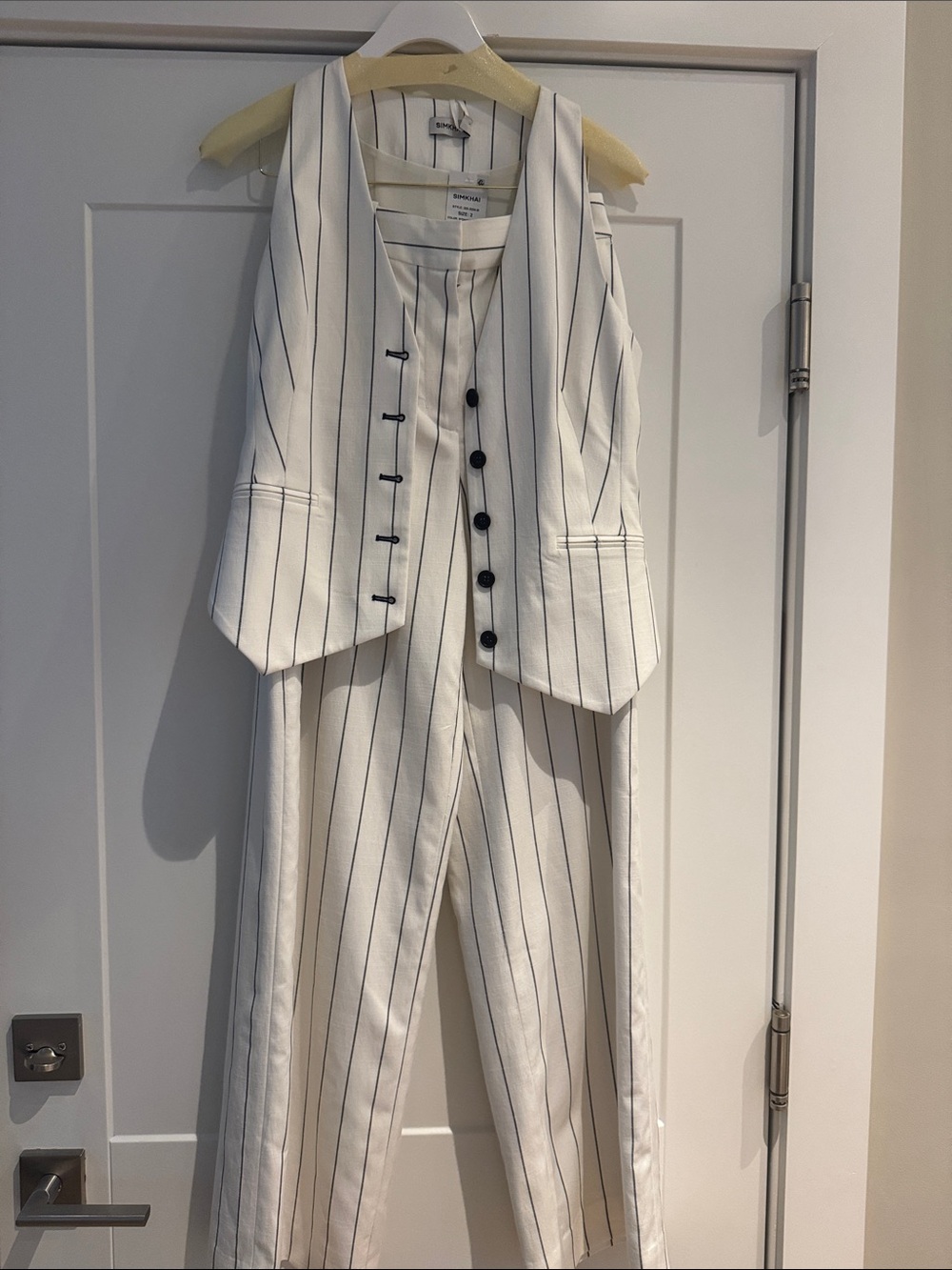 Pinstripe White & Black Women's Tailored vest and trouser. size 2. Fits full.